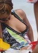 Beyonce naked pics - boob slip on a beach in hawaii
