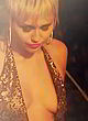Miley Cyrus naked pics - nip slip while performing