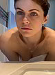 Alexandra Daddario naked pics - slight nip slip and cleavage