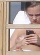 Cara Delevingne naked pics - topless on a balcony in malibu
