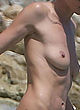 Heidi Klum topless again on the beach pics