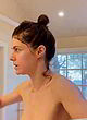 Alexandra Daddario naked pics - nude in bathroom, covered