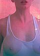 Rose McGowan shows tits in posture magazine pics