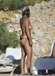 Rita Ora caught topless pics