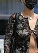 Bella Hadid braless in sheer black blouse pics