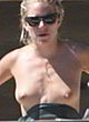 Sienna Miller sunbathing topless in la pics