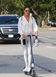 Alessandra Ambrosio scooter ride in baggy sweater pics