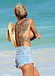 Blanka Lipinska topless & tattooed at beach pics