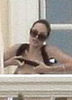 Angelina Jolie shows breasts on a balcony pics