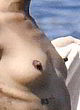 Zoe Saldana naked pics - bare her small tits on a yacht