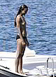Zoe Saldana standing topless on a boat pics