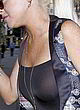 Lindsay Lohan visible boobs in black top pics