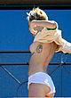 Miley Cyrus naked pics - visible small breasts outdoor
