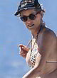 Sharon Stone naked pics - visible breast on the beach
