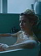 Lisa Dwan visible tits in bathtub scene pics
