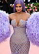 Kylie Jenner visible breasts in purple gown pics