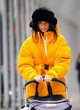 Emily Ratajkowski wearing a puffer yellow jacket pics