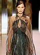 Bella Hadid walking in sheer gown pics