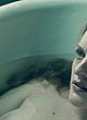 Elisabeth Moss shows her boobs in bathtub pics