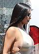Kim Kardashian no bra in sheer silver top pics