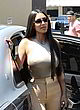 Kim Kardashian yellow pants & sheer top pics