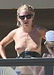Sienna Miller naked pics - sunbathing & visible tits
