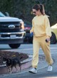Lily James goes out in a yellow sweatsuit pics