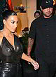 Kim Kardashian sheer to boobs with bodyguard pics