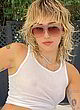 Miley Cyrus naked pics - sheer white tank top, tits