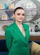 Joey King wore a dark green suit pics