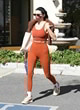 Kendall Jenner flashes her taut midriff pics
