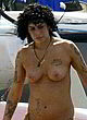 Amy Winehouse naked pics - exposing her tits in public