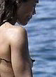 Zoe Saldana naked pics - shows her nude tits on boat