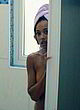 Melanie Liburd naked pics - flashing boobs in bathroom