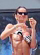Izabel Goulart flashing boob in bikini pics