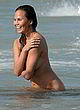 Chrissy Teigen naked at the beach photoshoot pics