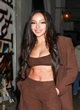 Tinashe stuns in a brown pantsuit pics