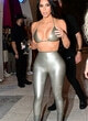 Kim Kardashian shows her bust in a bikini top pics