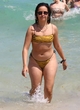 Camila Cabello wore tiger-stripe micro bikini pics