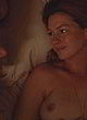 Anne Hathaway naked pics - lying and shows one breast