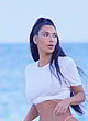 Kim Kardashian naked pics - visible breasts, wet t-shirt
