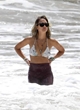 Jessica Alba shows figure in a bikini top pics