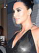 Kim Kardashian braless in a black sheer top pics