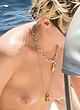 Kristen Stewart naked pics - sunbathing her boobs
