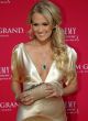 Carrie Underwood reveals sexy boobs and more pics