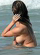 Chrissy Teigen fully nude at miami beach pics