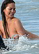 Chrissy Teigen naked pics - exposing tits at photoshoot