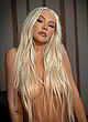 Christina Aguilera poses topless in bathroom pics