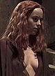 Dakota Johnson braless, visible tits in movie pics