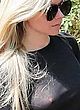 Avril Lavigne walks her dog in sheer top pics
